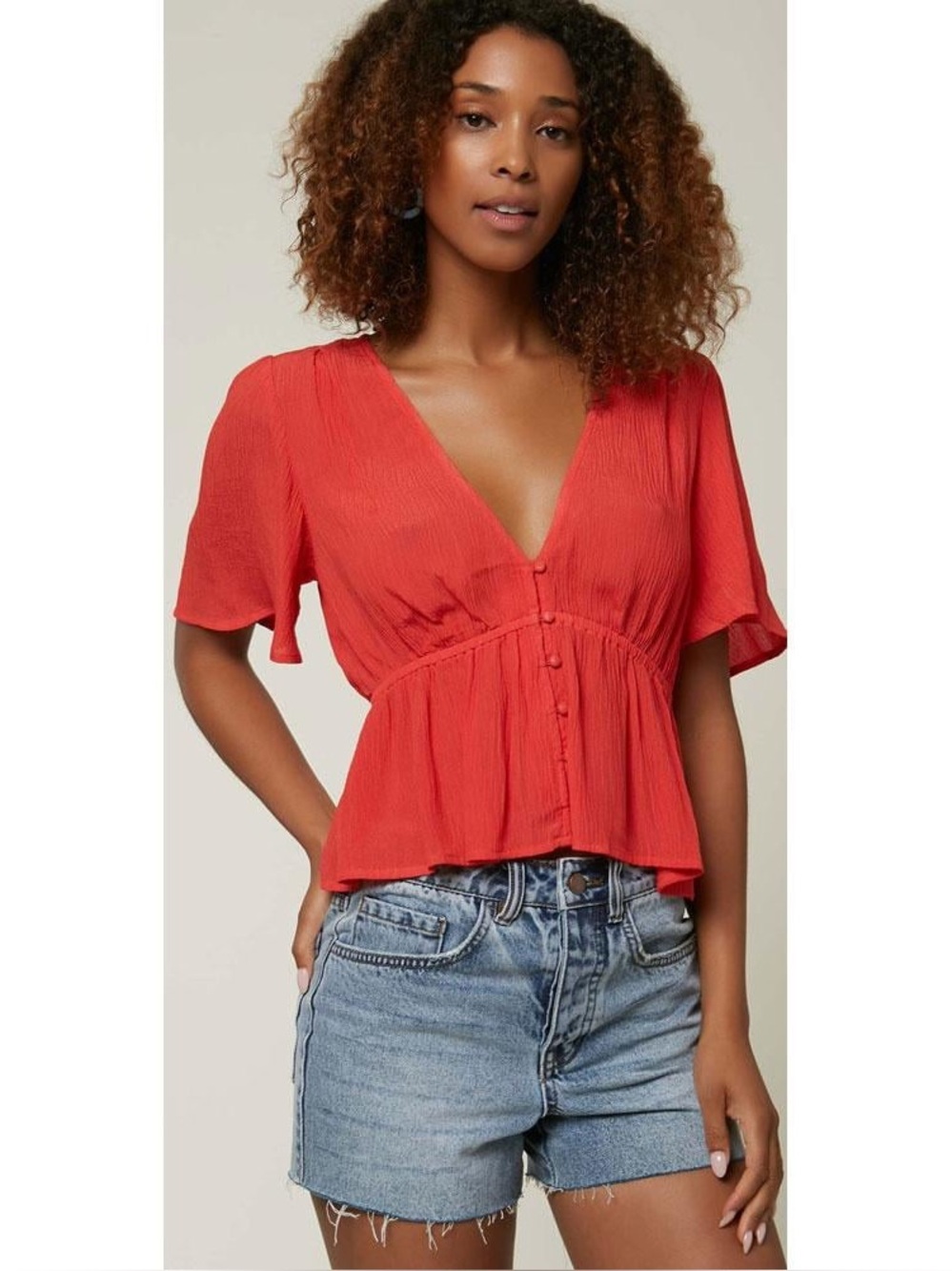 O'Neill Wes Solid V-Neck Button Peplum Top - “Bittersweet” Color